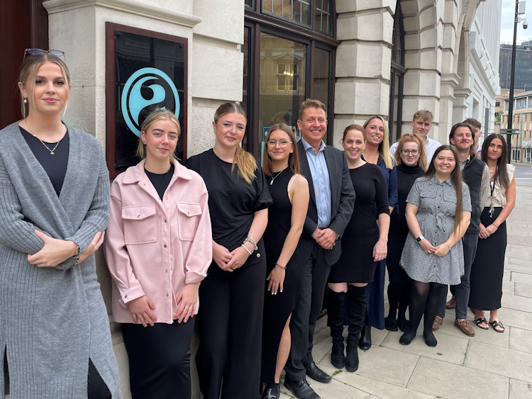 Attwells staff outside their Ipswich office